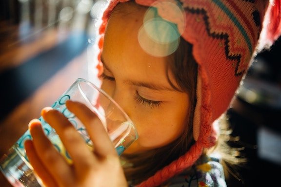 little girl drinking water