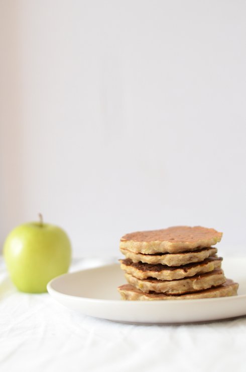 A photo of apple and banana pancakes for baby