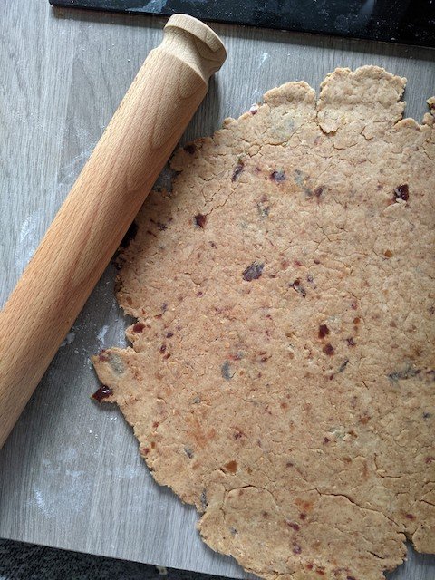 rolling of the spiced biscuits dough